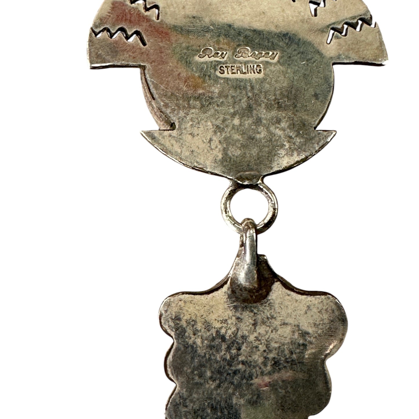 Reverse of Ray Bages sterling silver pendant showing Ray Bages signature and STERLING hallmark stamp
