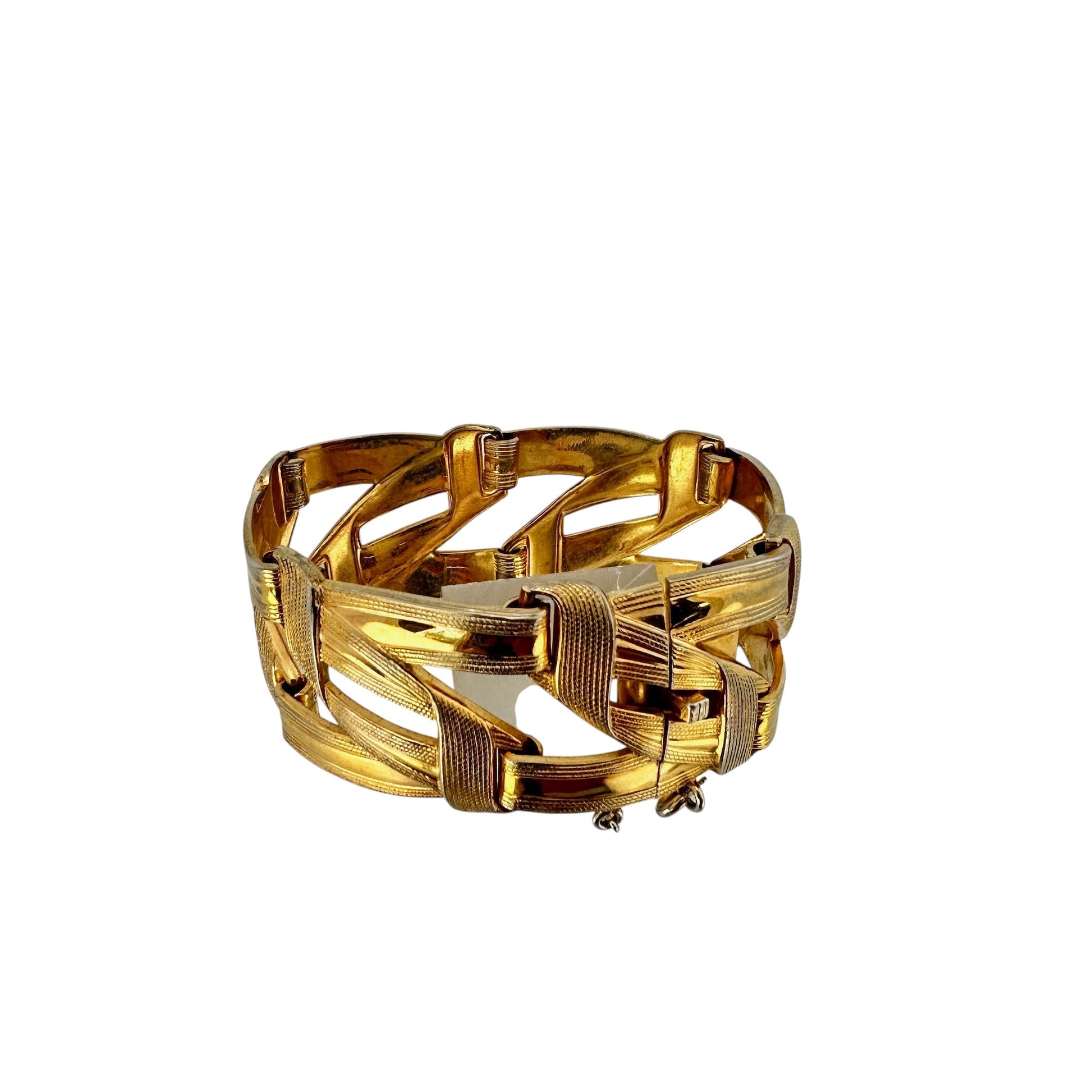 Vintage Grosse gold-tone wide link bracelet, angled side view showing textured wraps