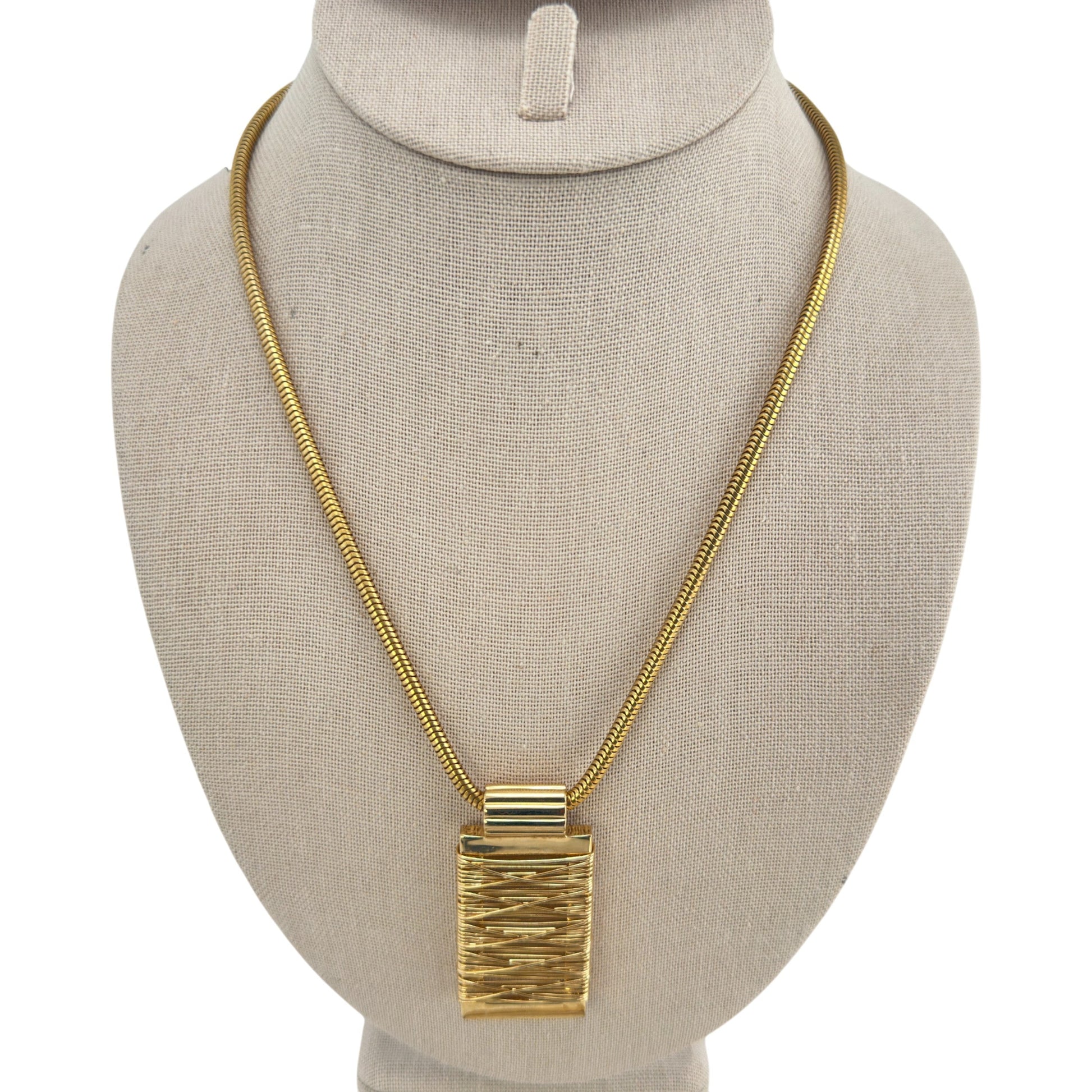 Sculptural gold-tone pendant necklace – front view
