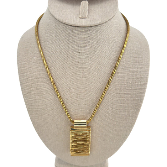 Sculptural gold-tone pendant necklace – front view