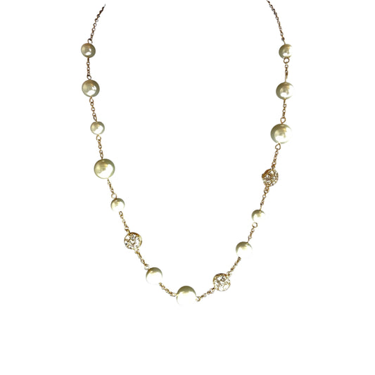 Gold-tone station necklace with alternating cream faux pearl beads and small pavé rhinestone disc links on fine cable chain