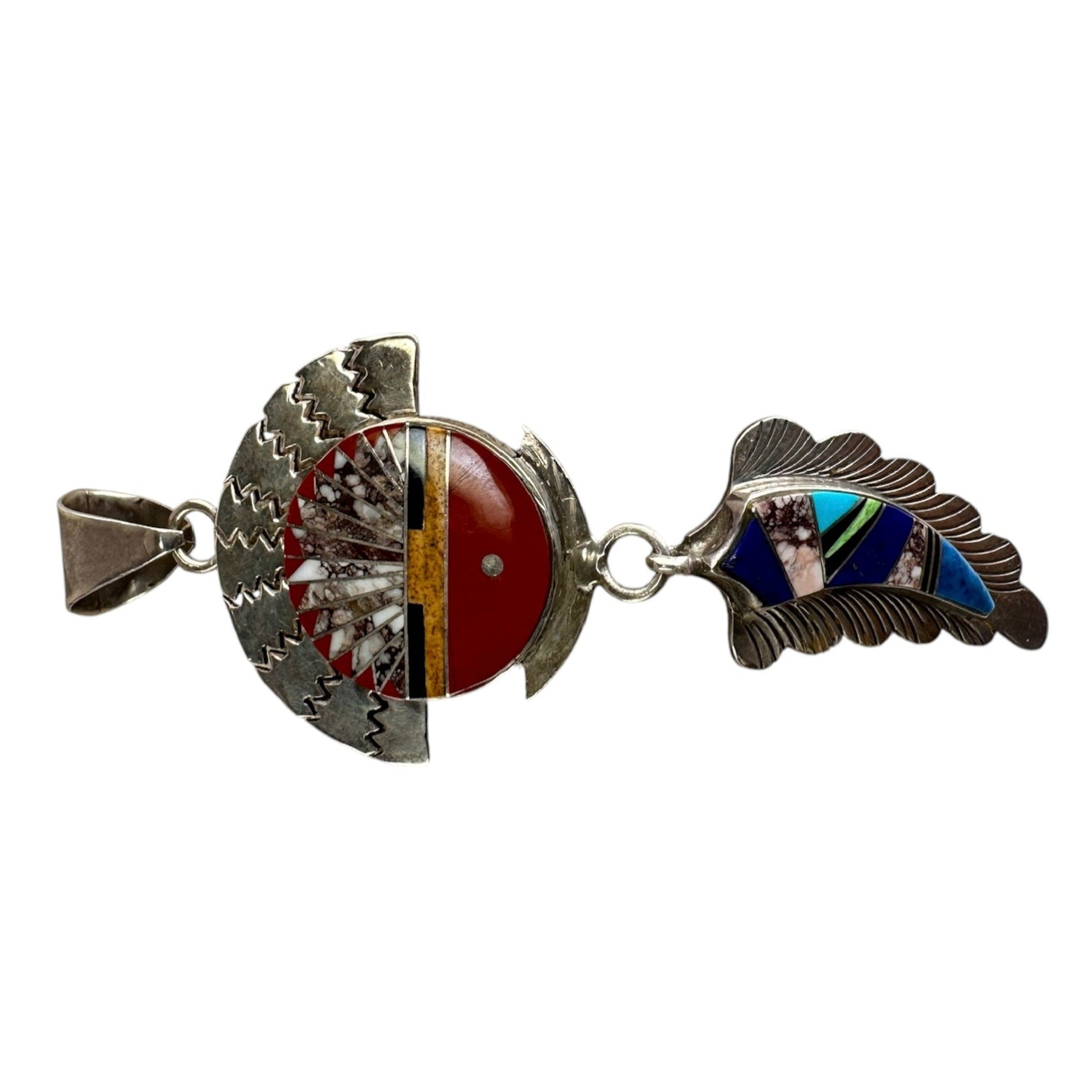 Close-up of circular sun face motif with coral, turquoise, lapis, spiny oyster, onyx, and jasper mosaic inlay on sterling ...