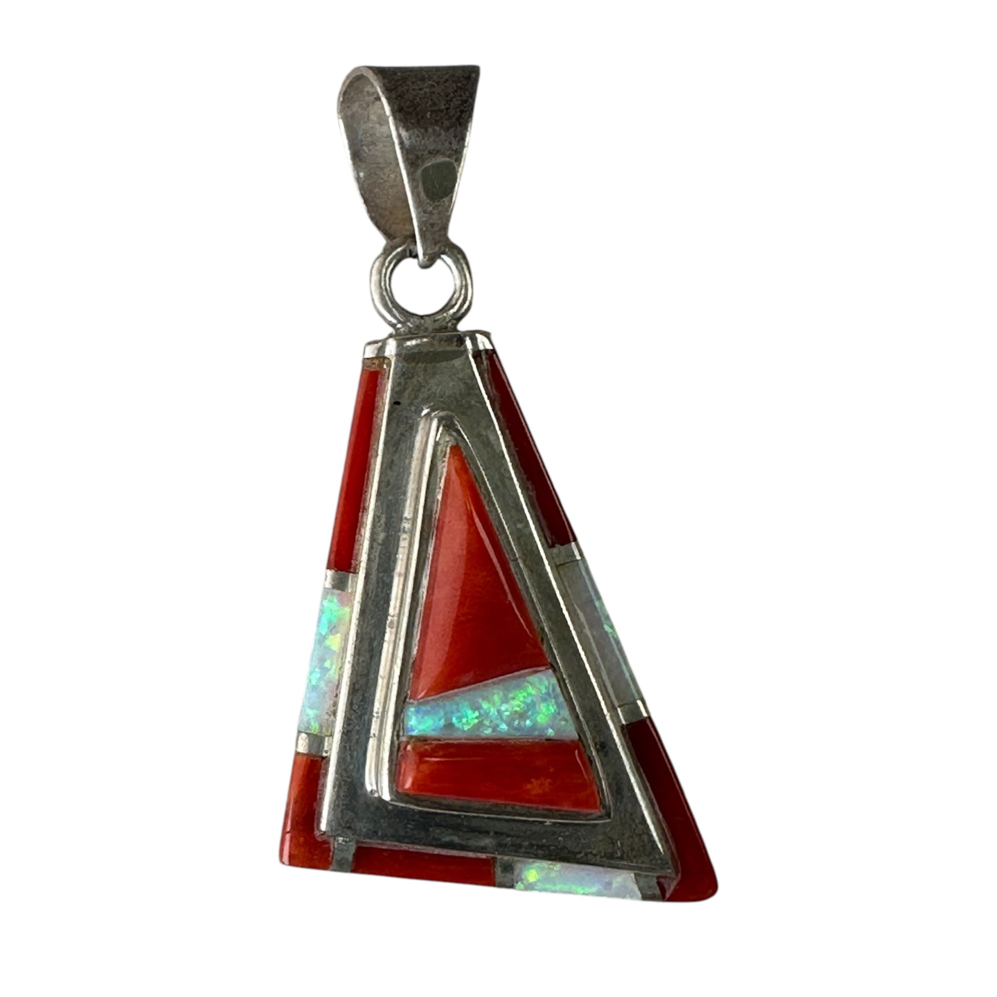 Triangular sterling silver pendant with channel inlay coral and opal in geometric pattern, signed LC, front view