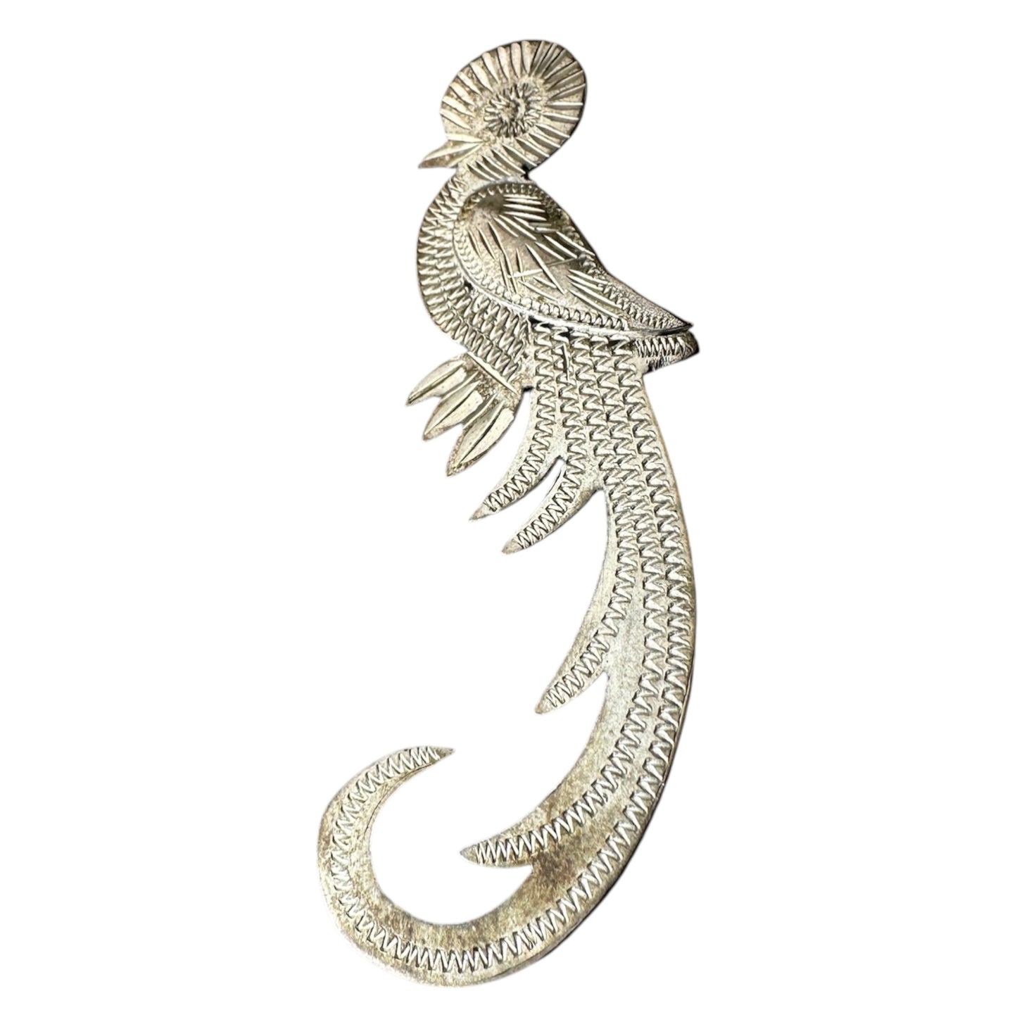 Reverse of sterling silver bird brooch showing rollover C-clasp, pin stem, dark oxidation patina, and partial stamp mark
