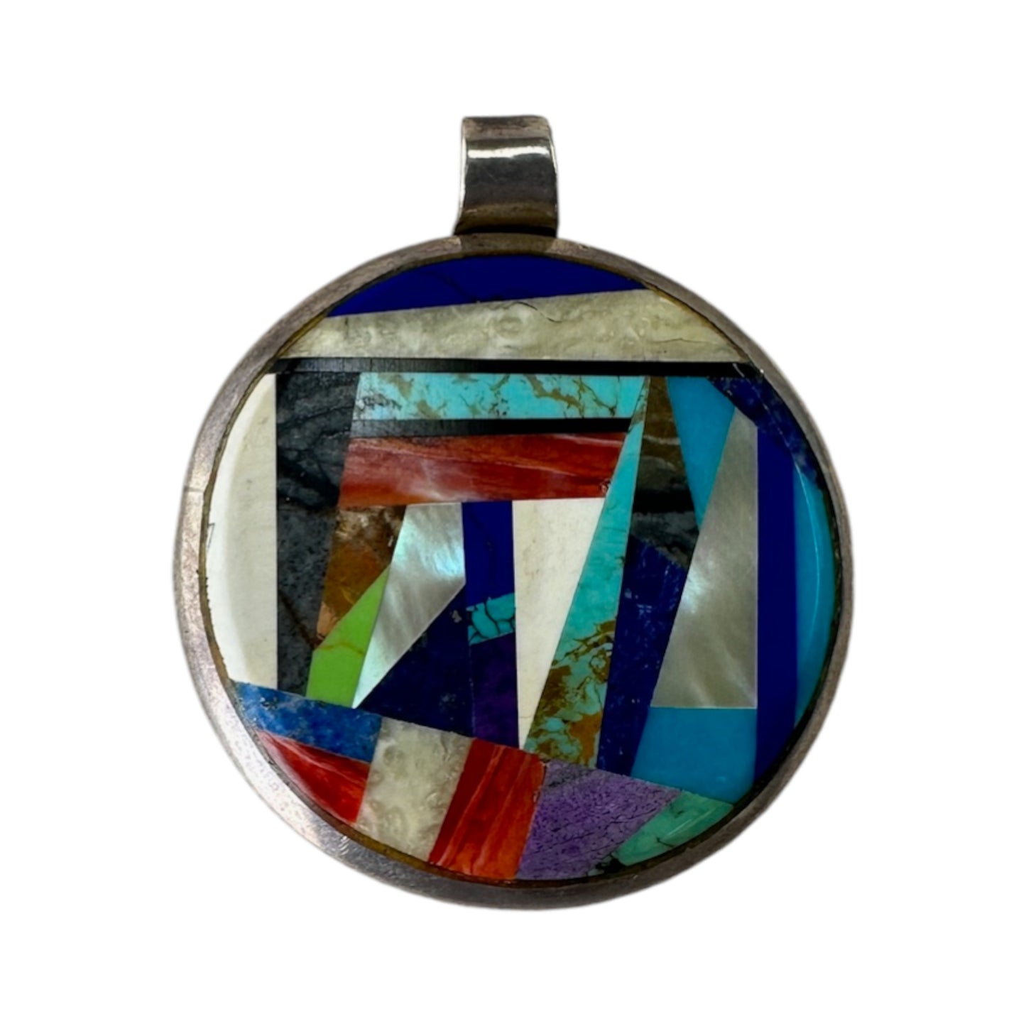 Reverse of signed WC sterling silver mosaic pendant showing domed silver back with STERLING hallmark and pin-brooch catch ...