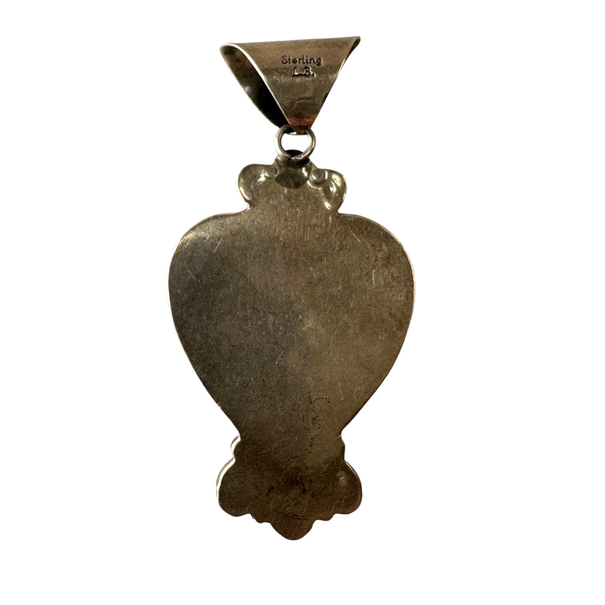 Full view of LB sterling silver heart pendant with triangular bail, jump ring, bezel-set spiny oyster shell, and clustered...
