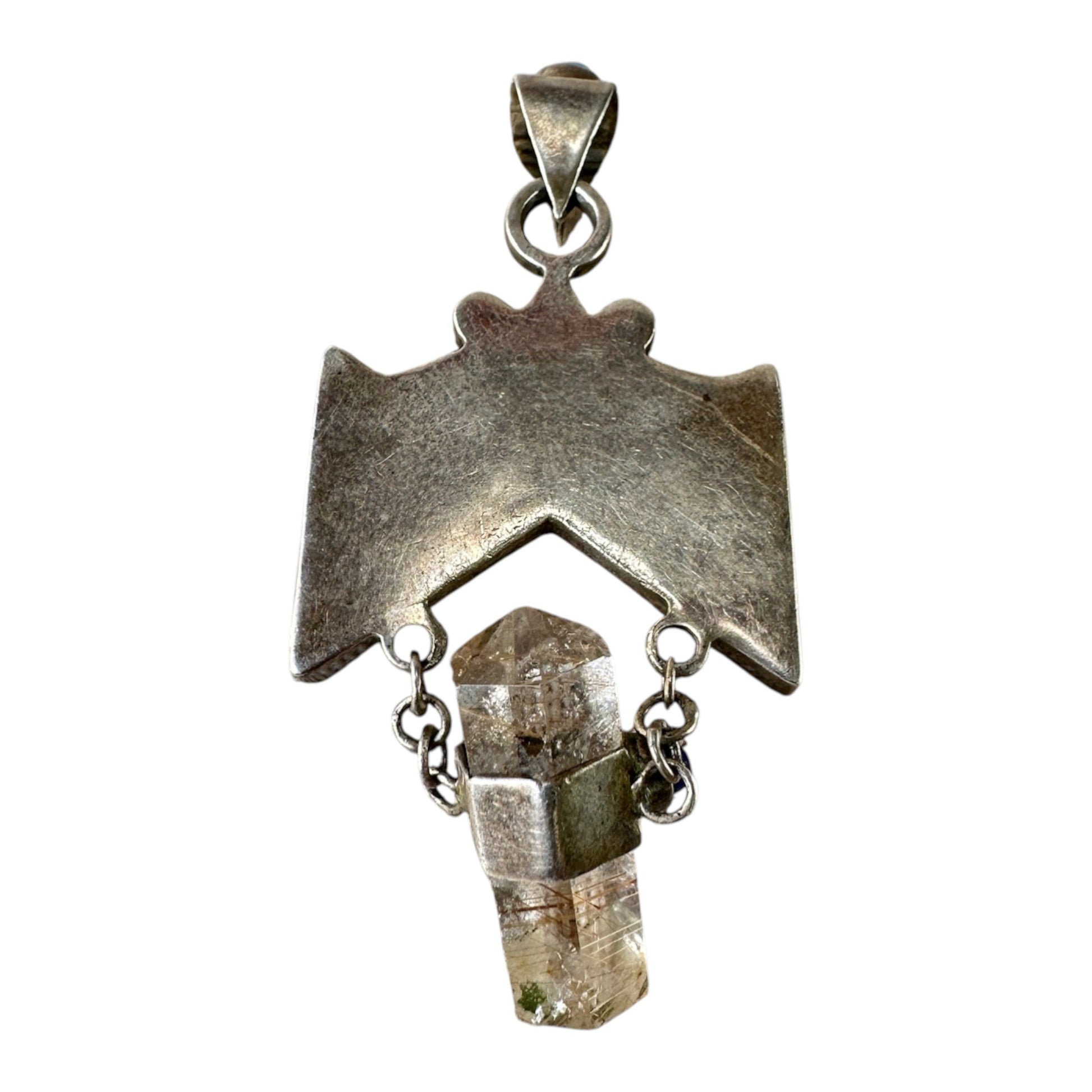 Reverse of pendant showing flat-pressed sterling silver sheet with hand-fabrication marks, light patina, and open chevron ...