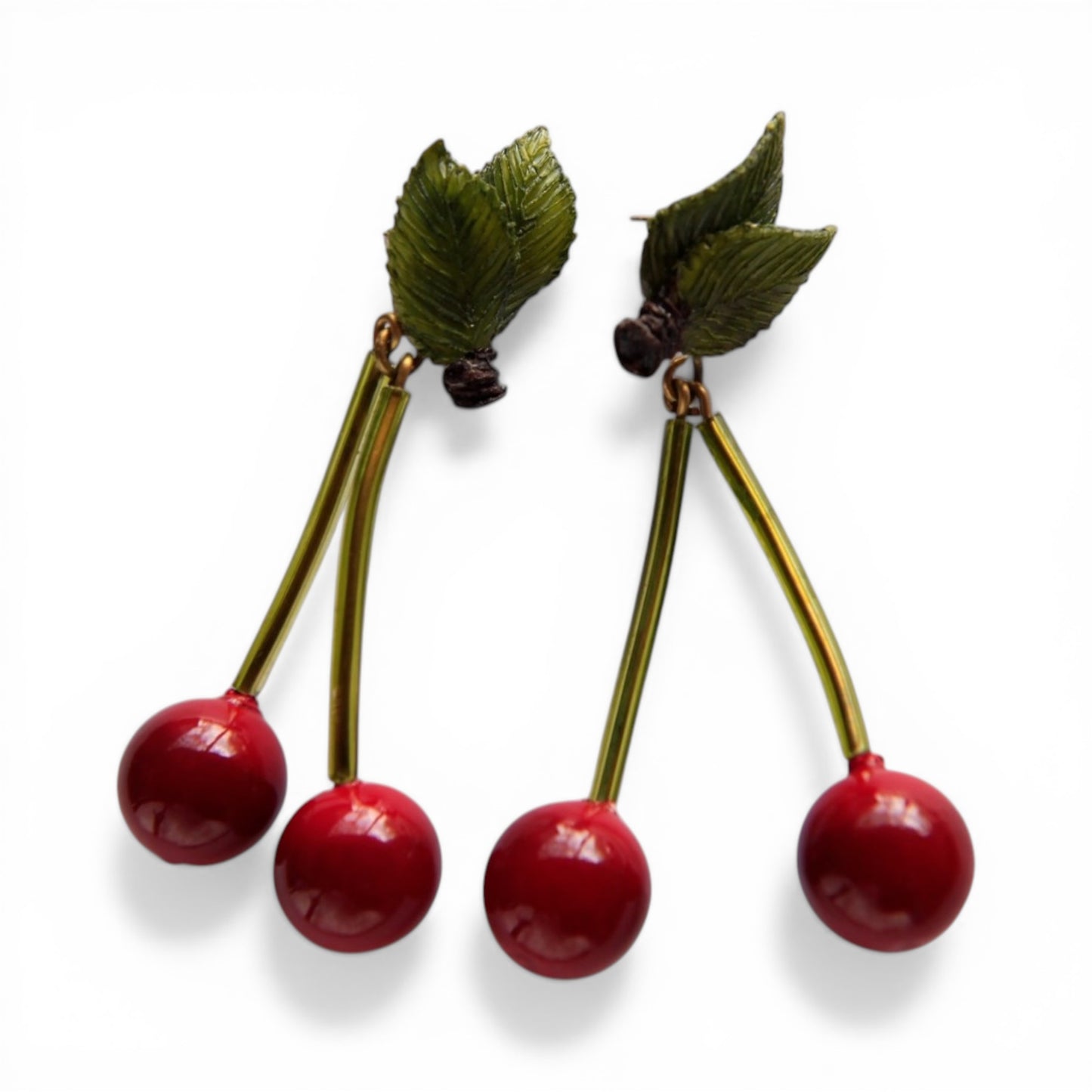Cilea Paris cherry dangle pierced earrings with red glass bead spheres, gold-tone tube stems, and green molded resin leaf ...