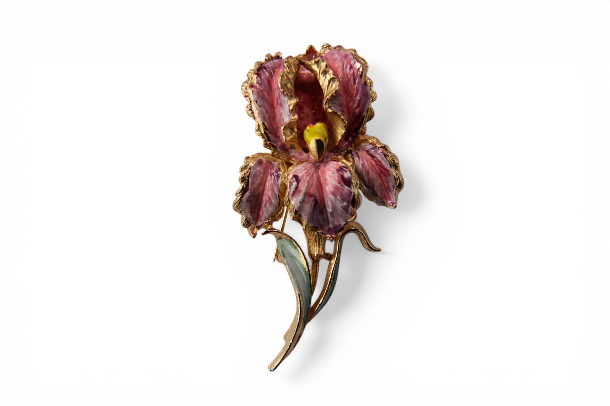 Close-up of ruffled enamel petals on mid-century iris brooch showing textured gold-tone cast metal petal edges