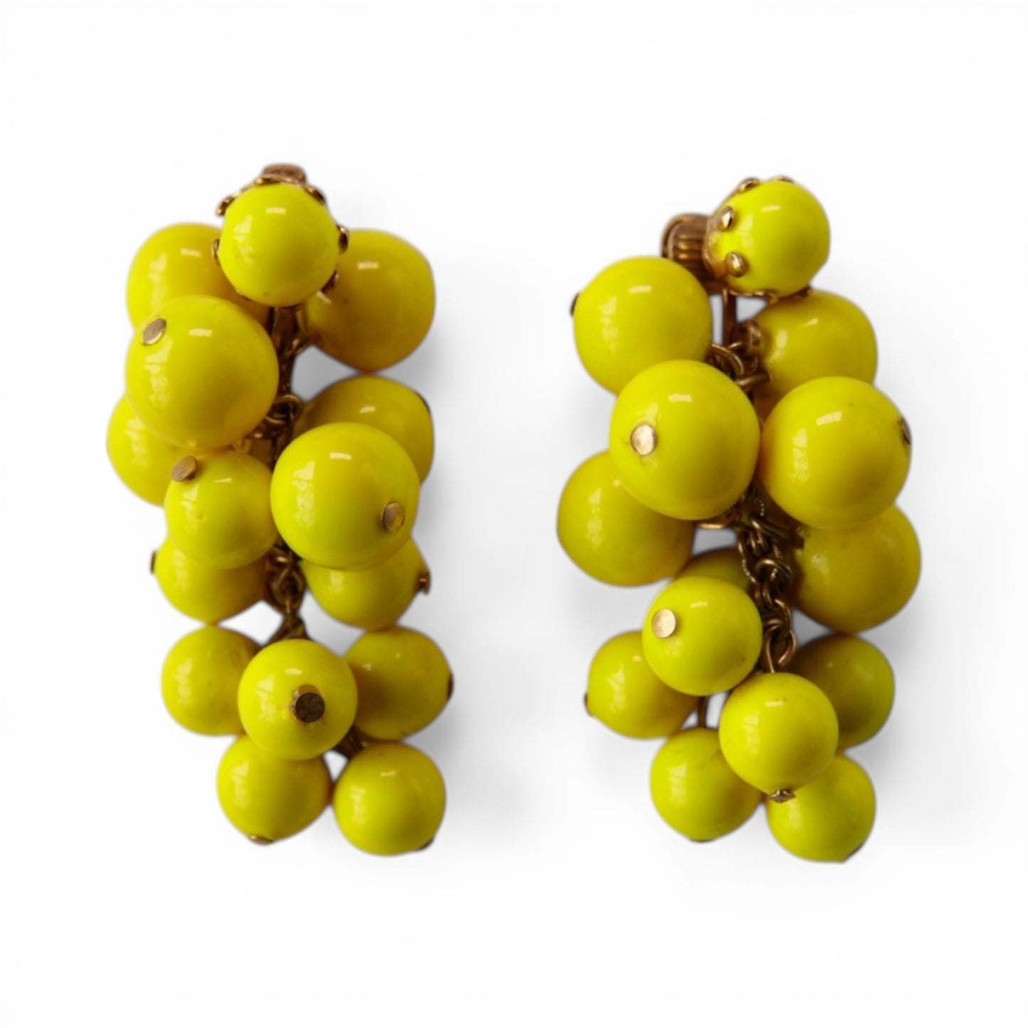 Pair of chartreuse yellow-green glass bead cluster earrings in grape-bunch formation with gold-tone chain framework, clip-...