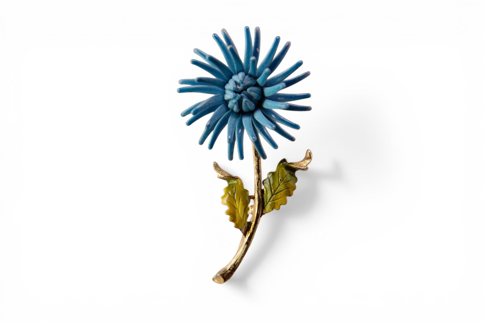 Blue enamel chrysanthemum brooch with gold-tone stem and green enamel leaves, front view, approx. 2.5 inches