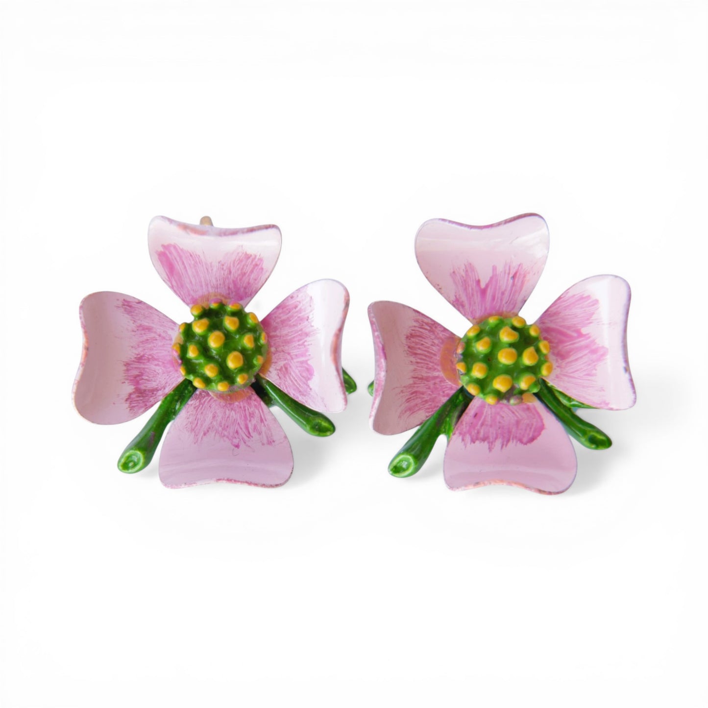 Pair of four-petal pink enamel flower clip-on earrings with green domed centre and yellow dot accents, gold-tone findings