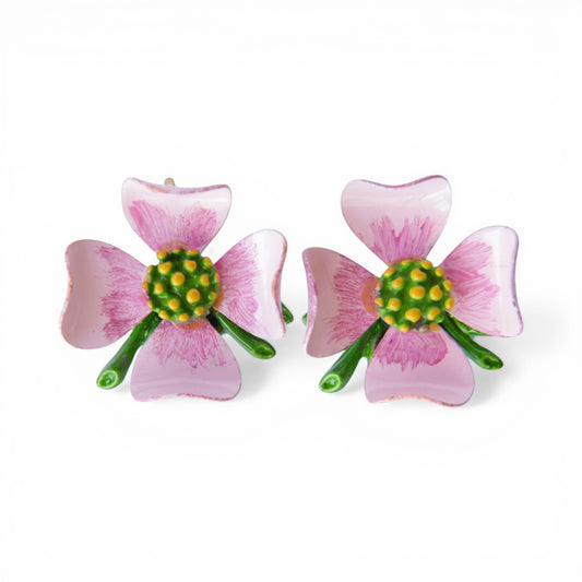 Pair of four-petal pink enamel flower clip-on earrings with green domed centre and yellow dot accents, gold-tone findings