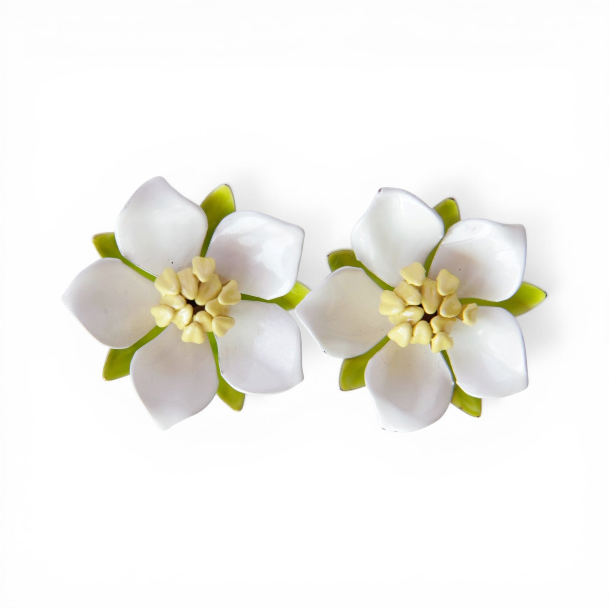 SARAH COV clip-on earrings, five white enamel petals with pale yellow stamen cluster and chartreuse green enamel sepal lay...