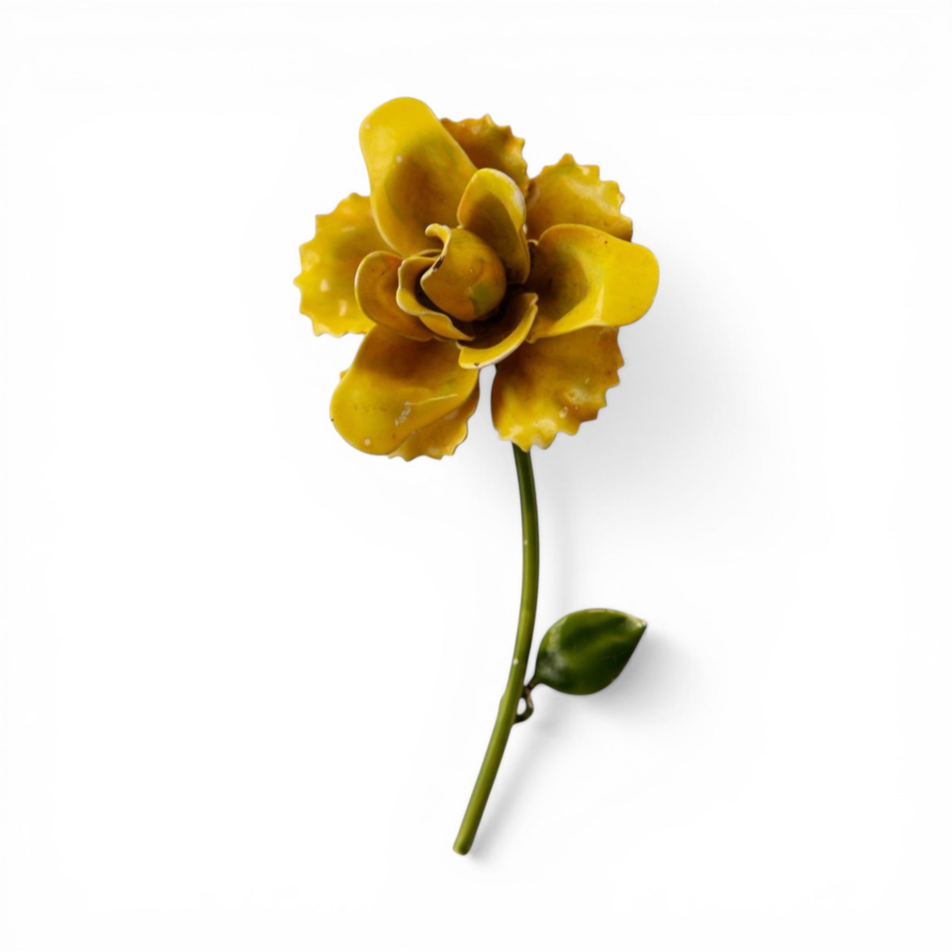 Three-dimensional yellow enamel rose brooch with layered ruffled petals, stem, bud, and leaf detail, front view