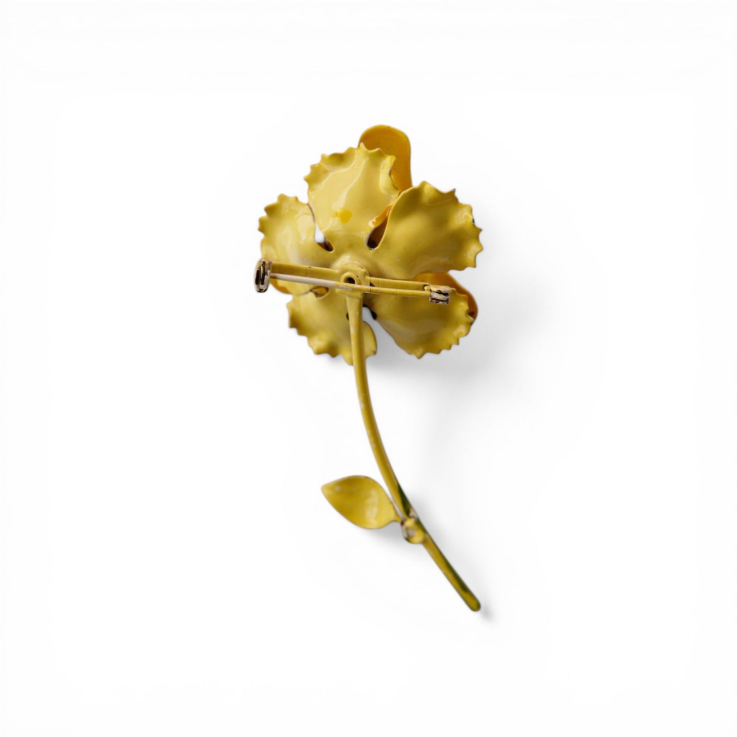 Close-up of layered ruffled petal construction on yellow enamel Mid Century Modern rose brooch showing dimensional depth