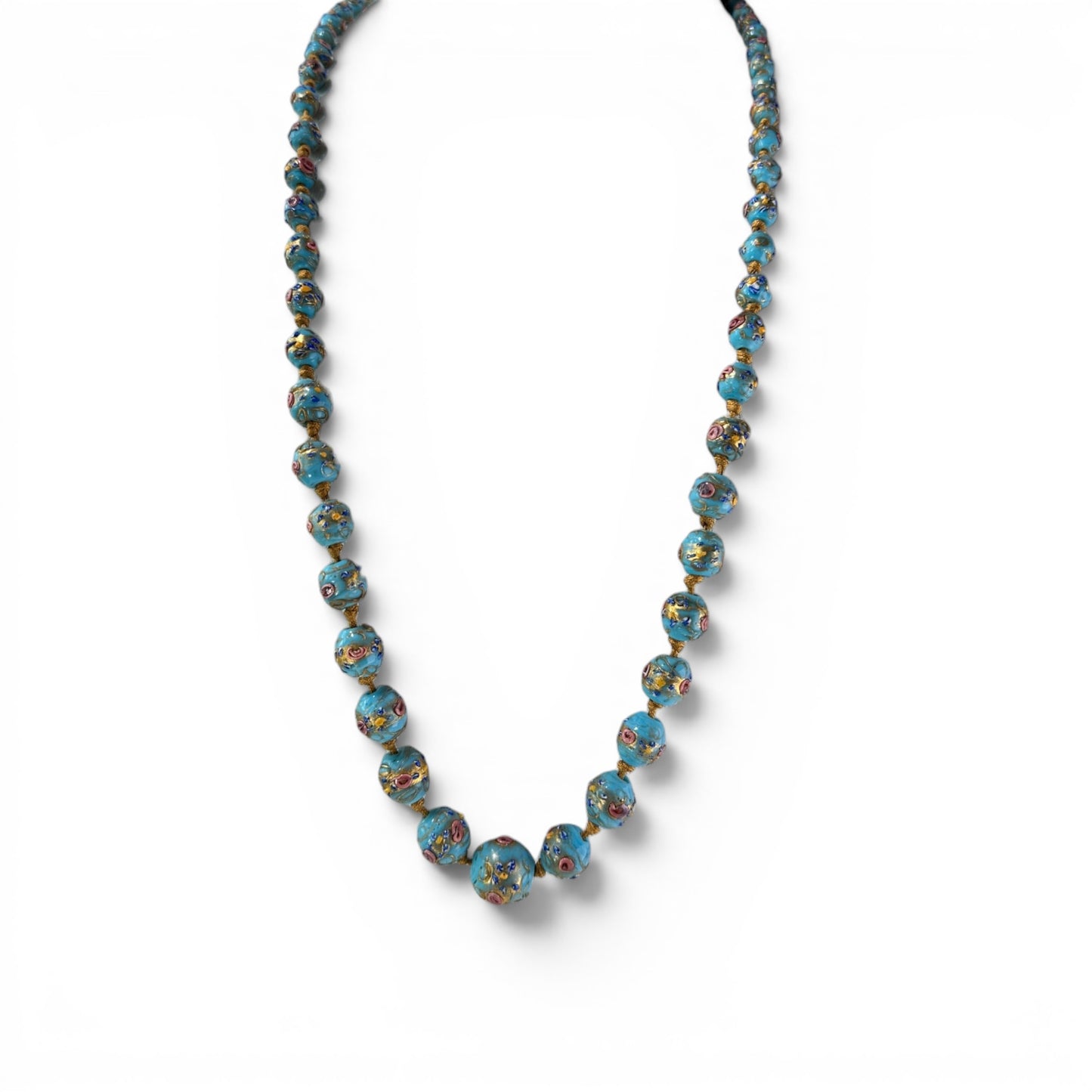 Graduated turquoise-blue Murano glass bead necklace with raised multicolor floral appliqué, hand-knotted on gold-tone cord...
