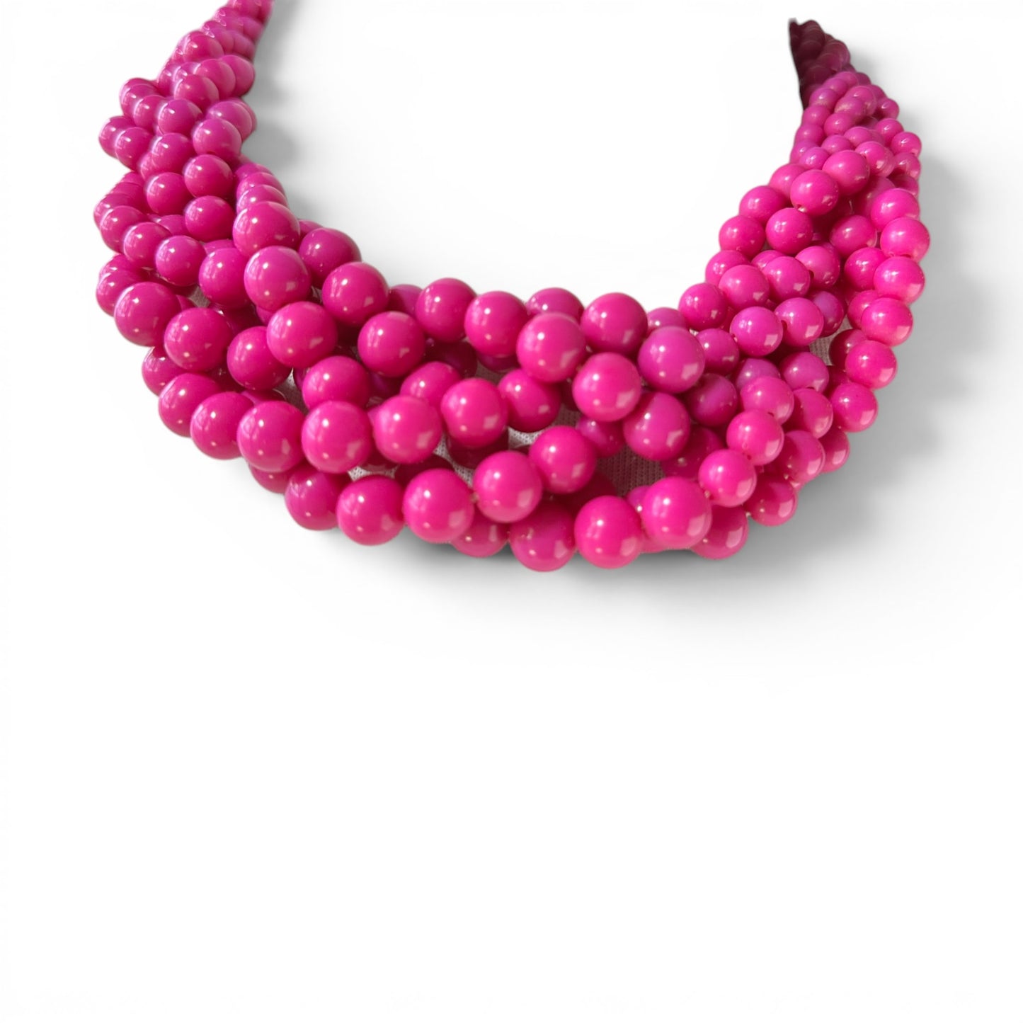 Multi-strand hot pink acrylic bead bib necklace with twisted strands and gunmetal lobster claw clasp, front view