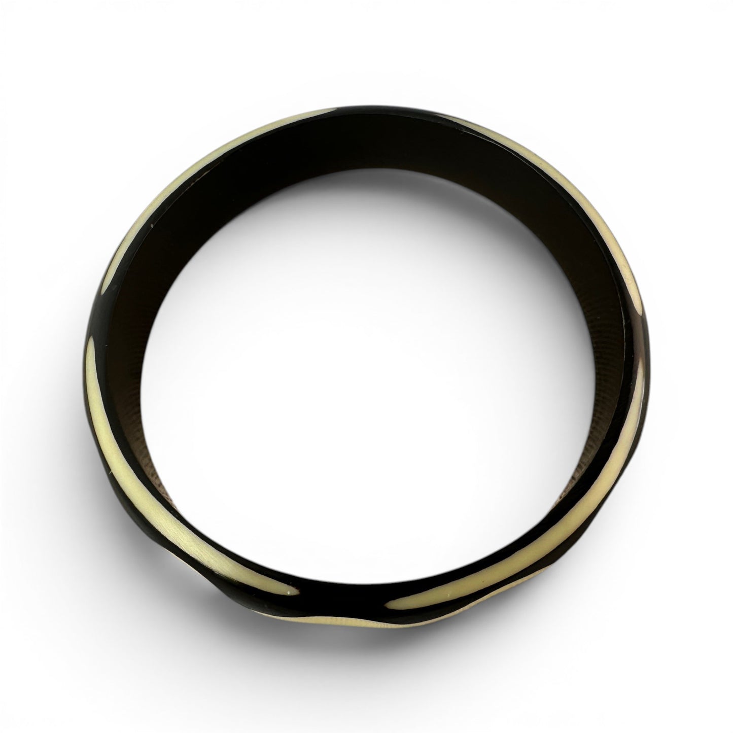 Hand-carved two-tone Bakelite bangle — detail of carving
