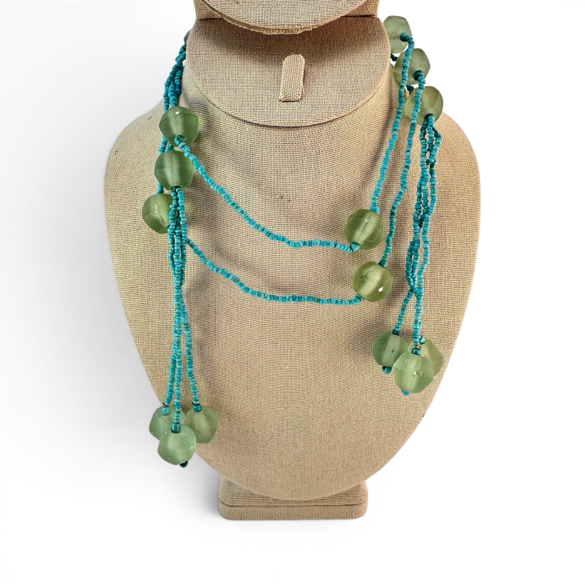 Handmade 48-inch turquoise seed bead rope necklace with frosted green glass beads on bust