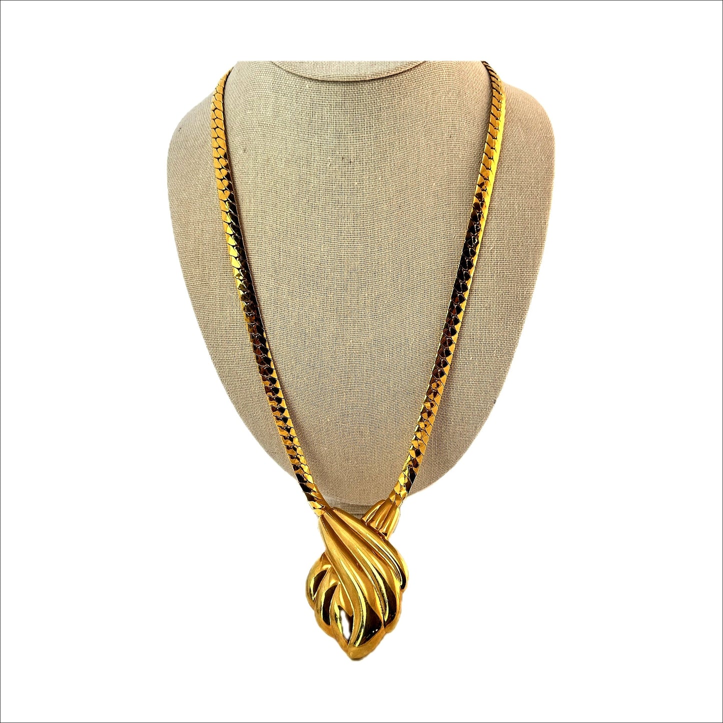 Napier gold-tone fan pendant necklace — on display bust