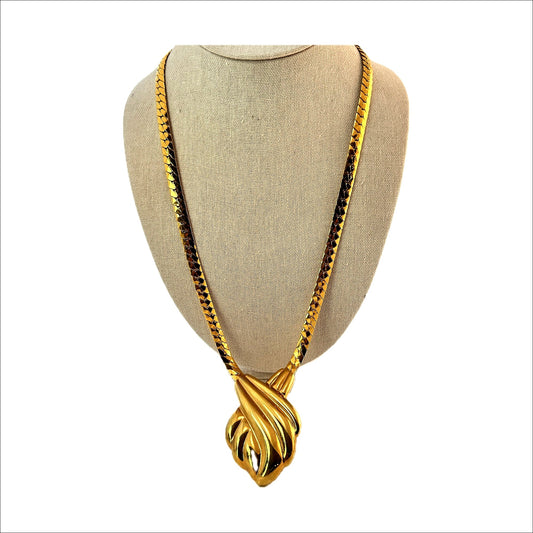 Napier gold-tone fan pendant necklace — on display bust