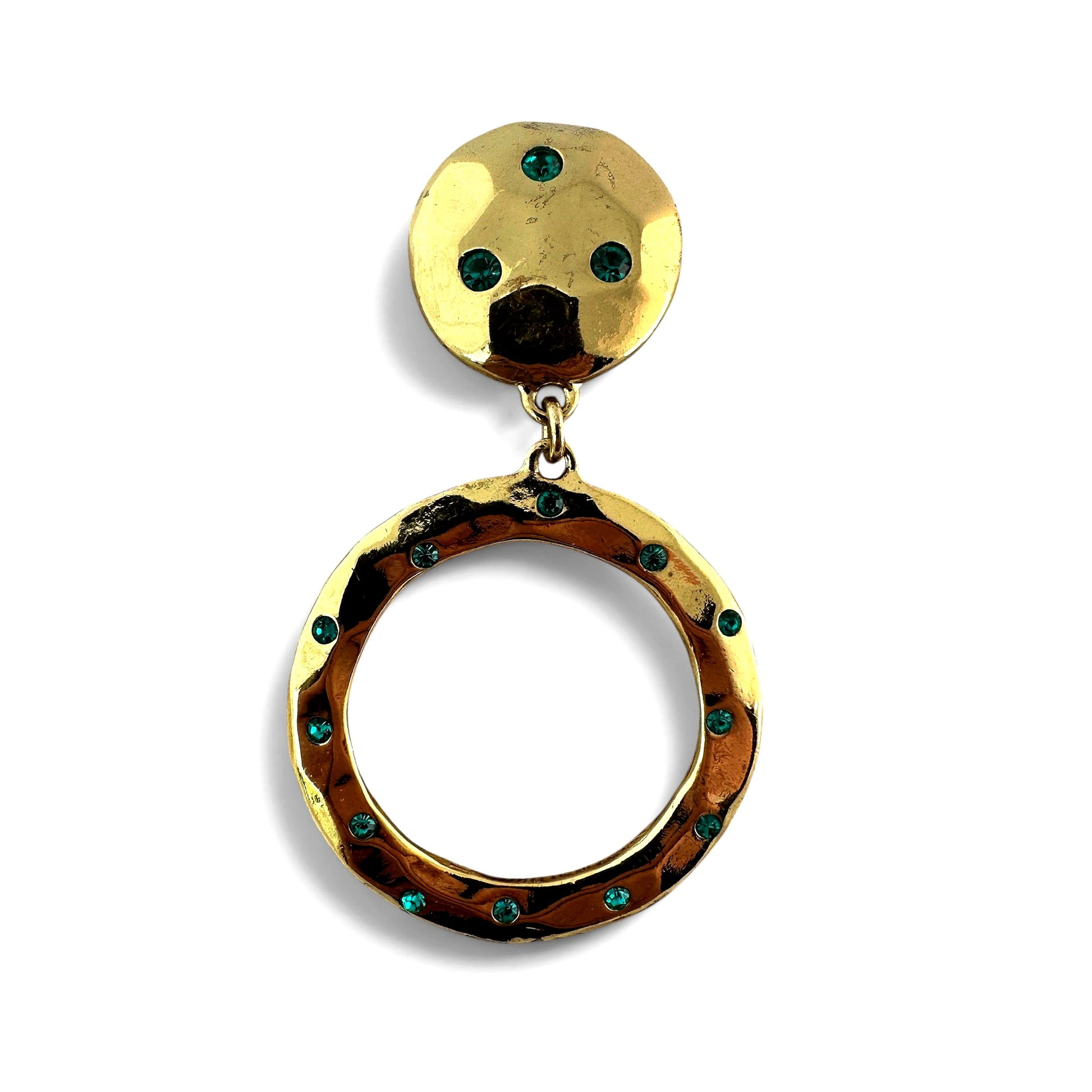 Close-up of hammered gold-tone hoop showing evenly spaced teal and emerald-green faceted faux rhinestones around circumfer...