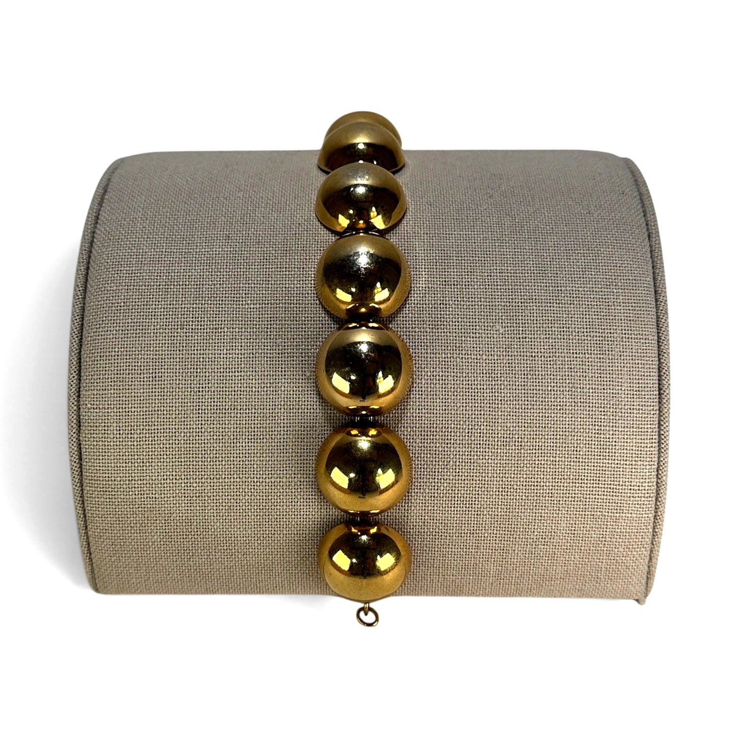 Monet gold-tone bracelet with large polished spherical beads linked by small jump rings, approx. 7 inches long