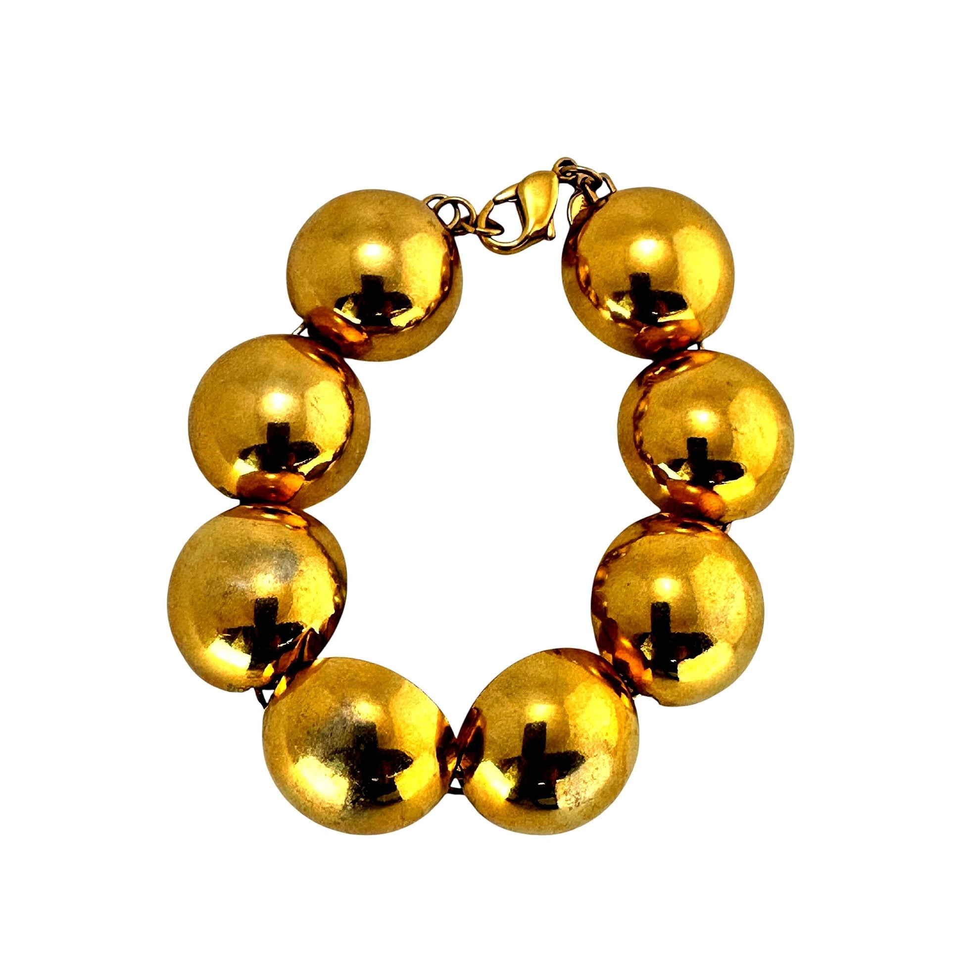 Monet goldtone bracelet with polished half-sphere links, sculptural minimalist design