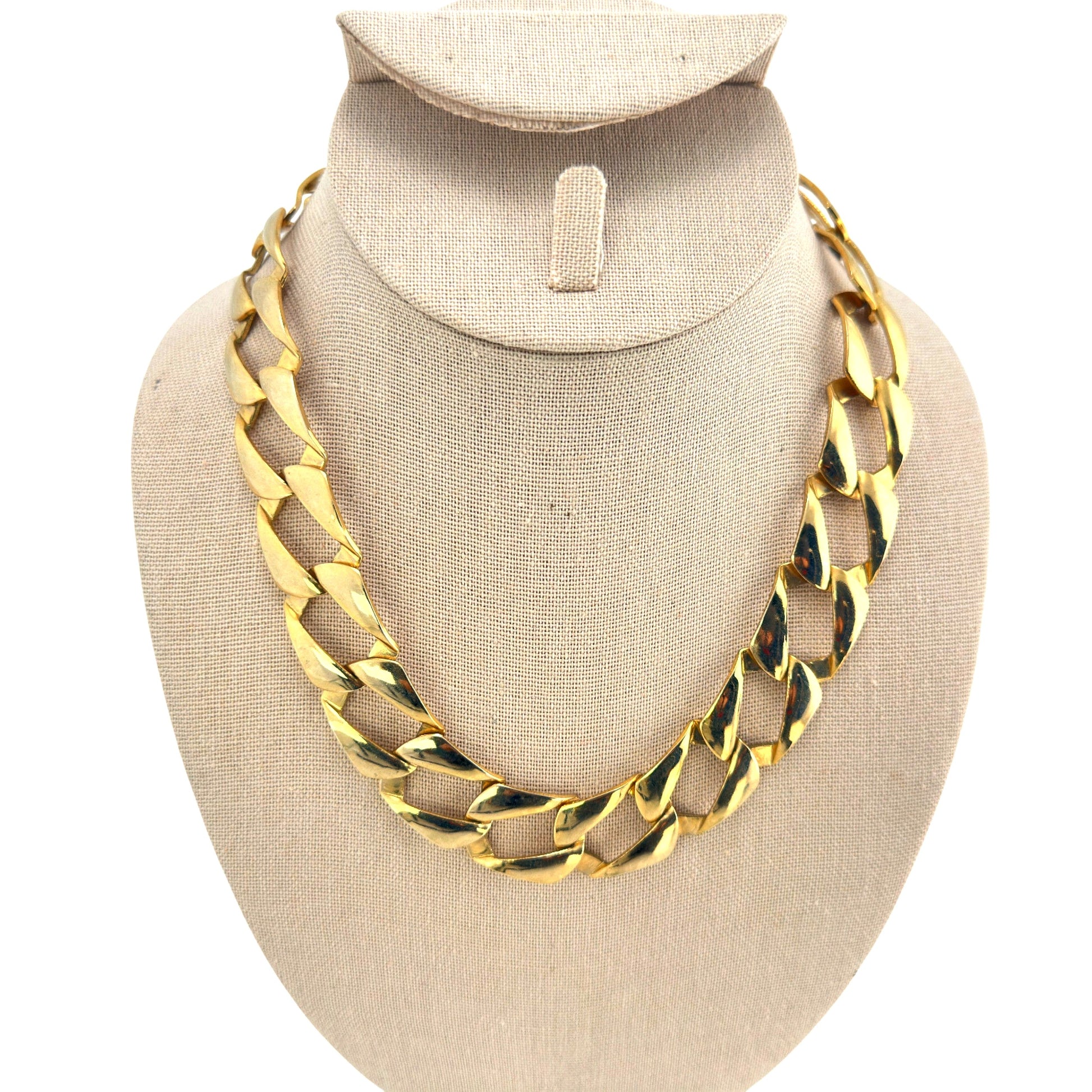 Vintage chunky gold-tone curb link necklace displayed on a bust