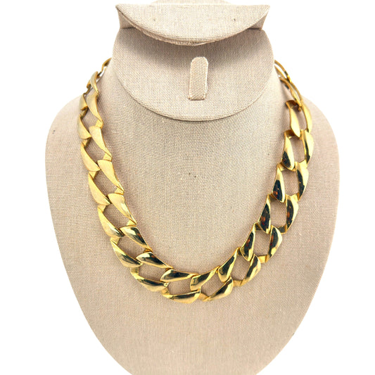 Vintage chunky gold-tone curb link necklace displayed on a bust