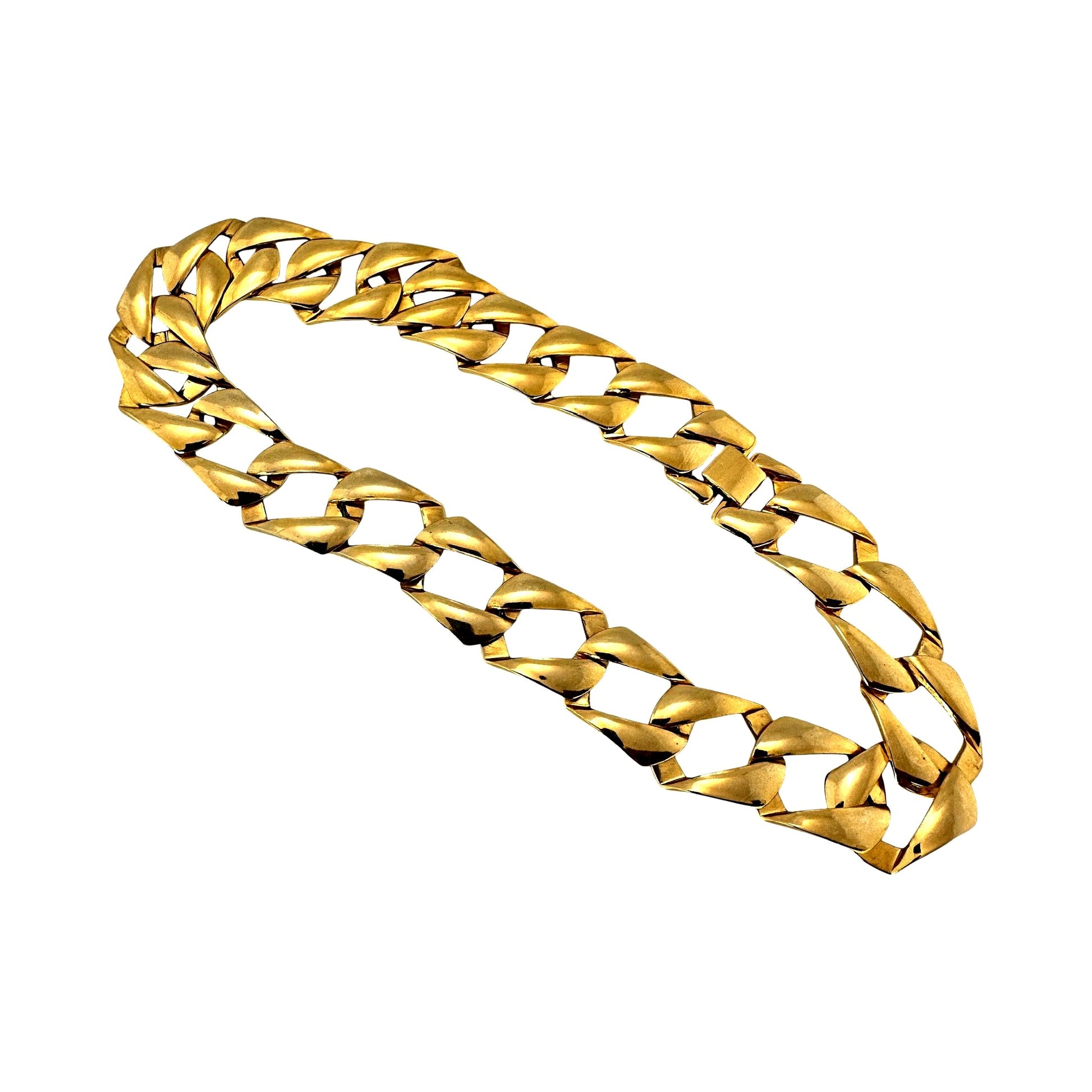 Gold-tone curb link chain necklace, full strand on white background