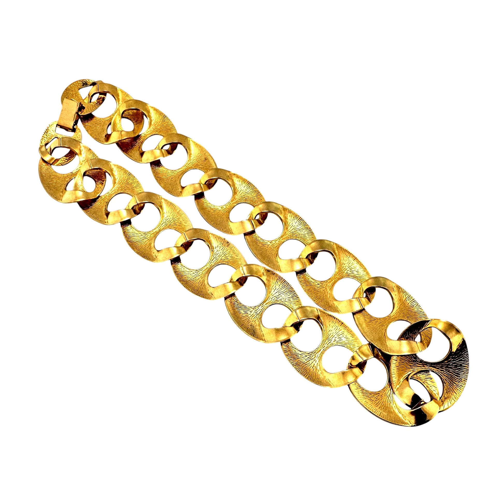 Chunky elliptical gold-tone link necklace – angled view