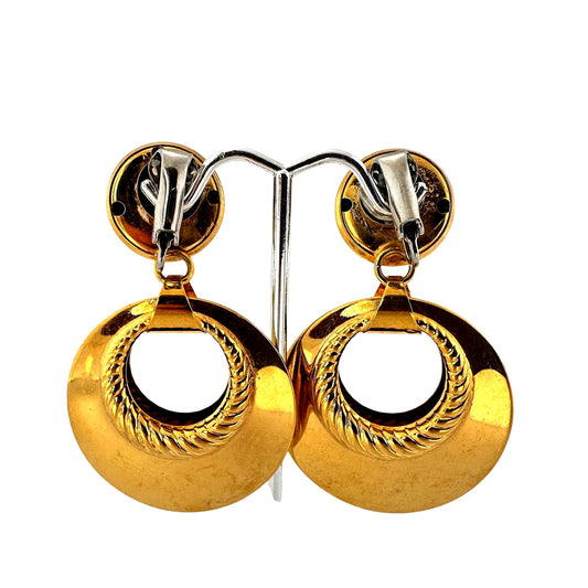 Embossed gold-tone disc earrings – angled view