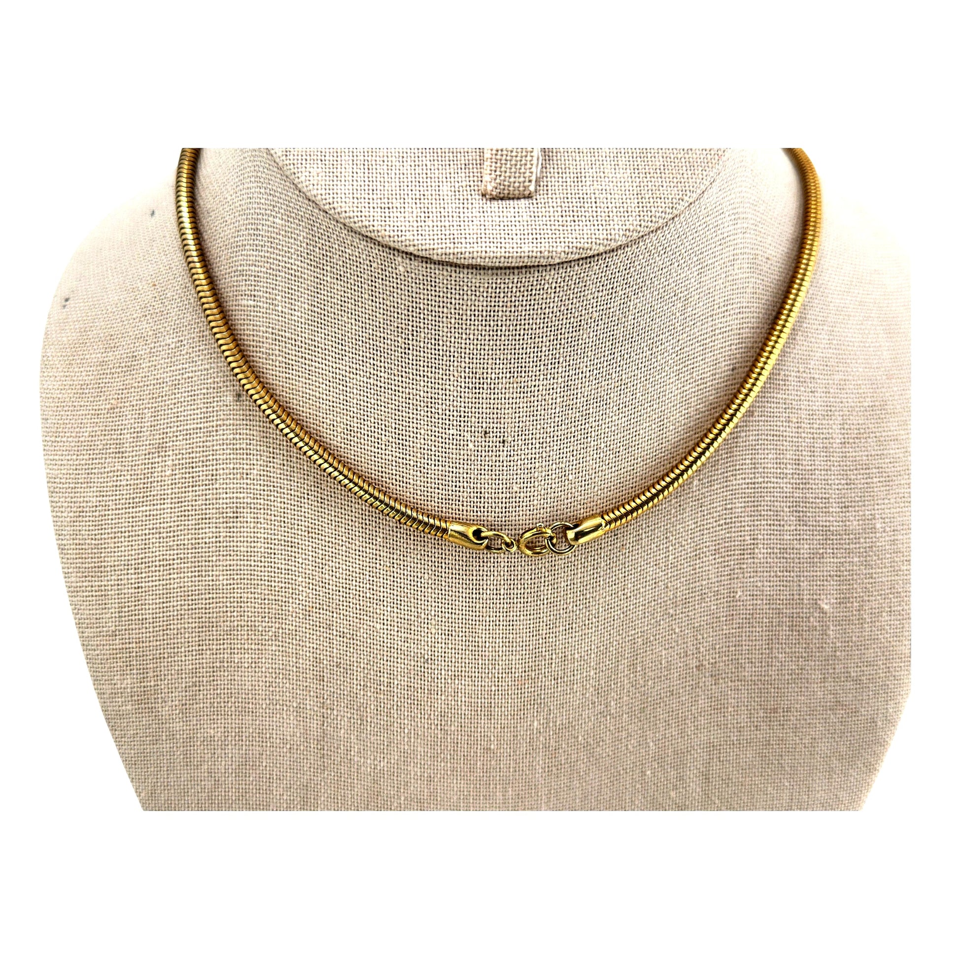 Slim gold-tone snake chain necklace – on neck display