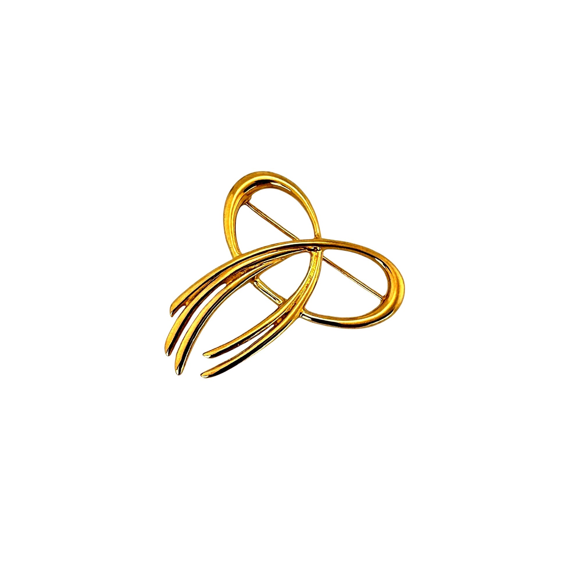 Vintage double-loop brooch in gold tone, front view angled
