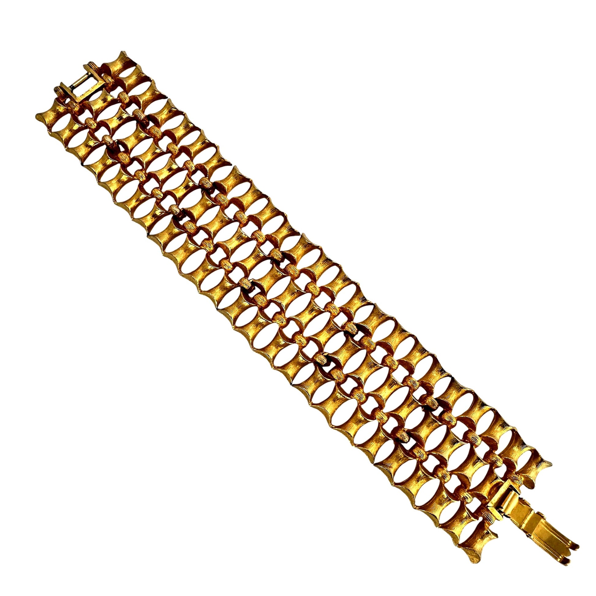 Wide goldtone bracelet with sculptural ridged wave pattern, 1970s modernist style
