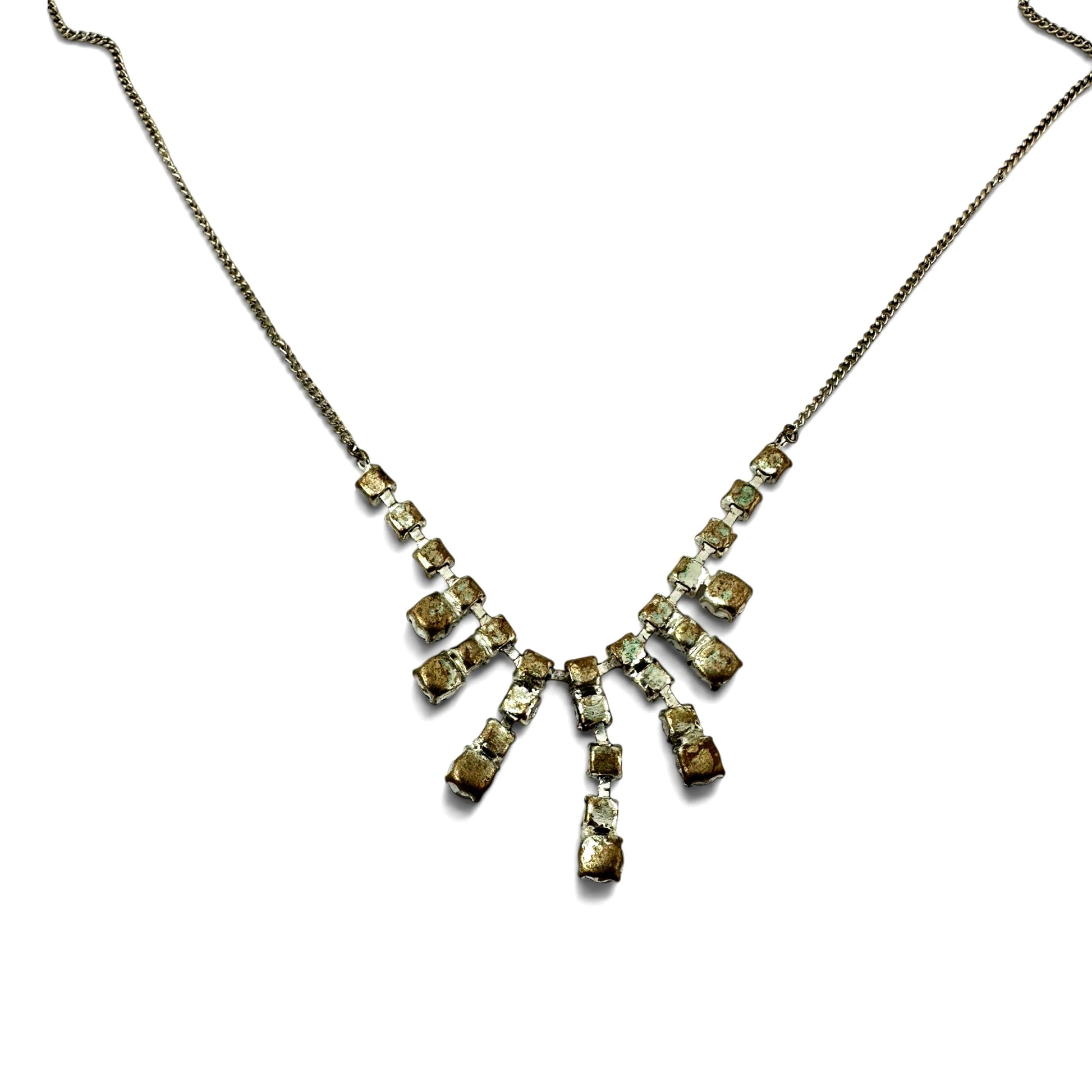 Full front view of graduated rhinestone fringe bib necklace with fine rope chain and spring ring clasp