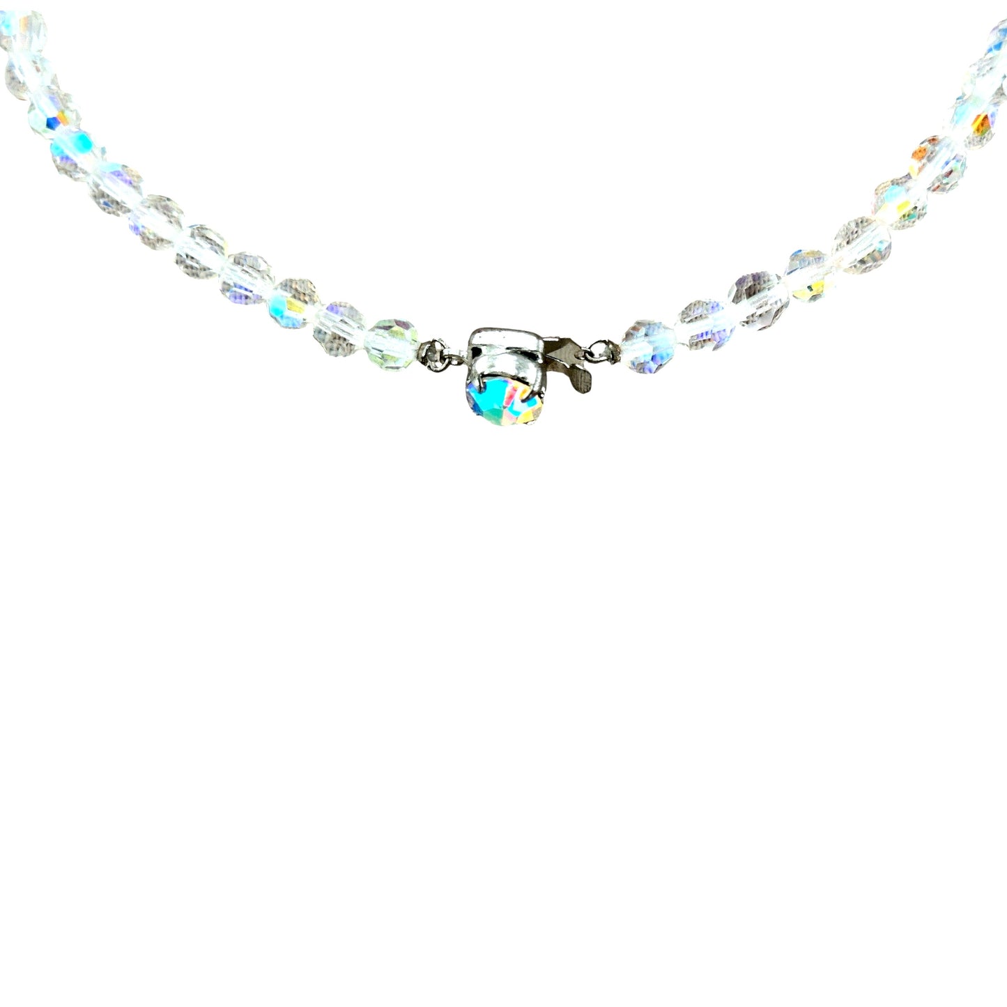 Graduating faceted aurora borealis crystal bead strand leading to a three-cluster open wirework bib, full necklace laid flat