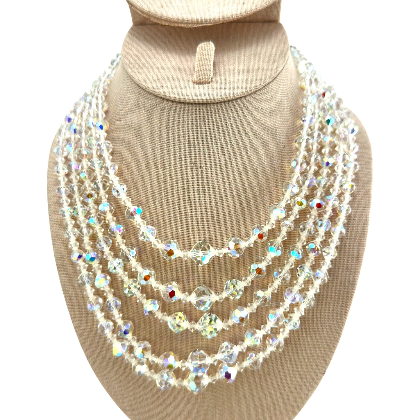 Five-strand aurora borealis crystal bib necklace with graduated clear faceted beads and rhodium-plated rhinestone bar clas...