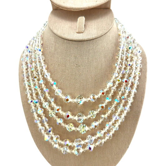 Five-strand aurora borealis crystal bib necklace with graduated clear faceted beads and rhodium-plated rhinestone bar clas...