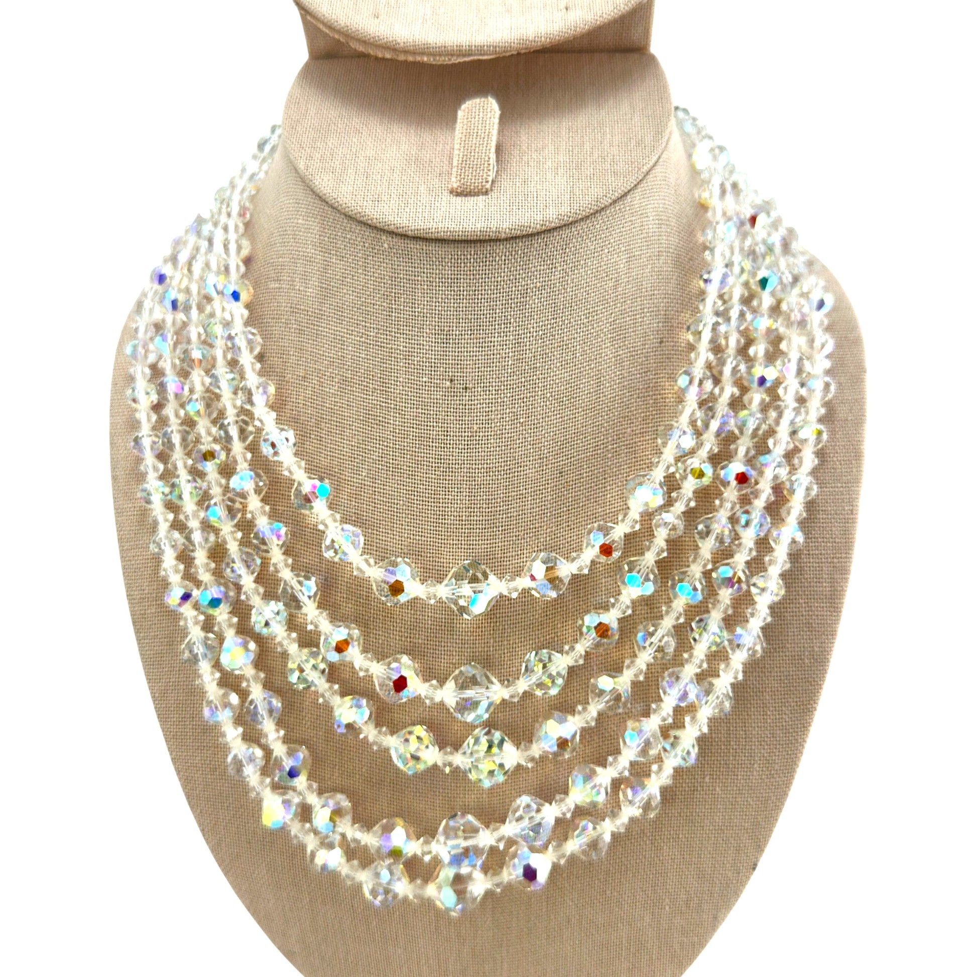 Full-length lay-flat view of graduated five-strand crystal bib necklace measuring approximately 16.5 inches