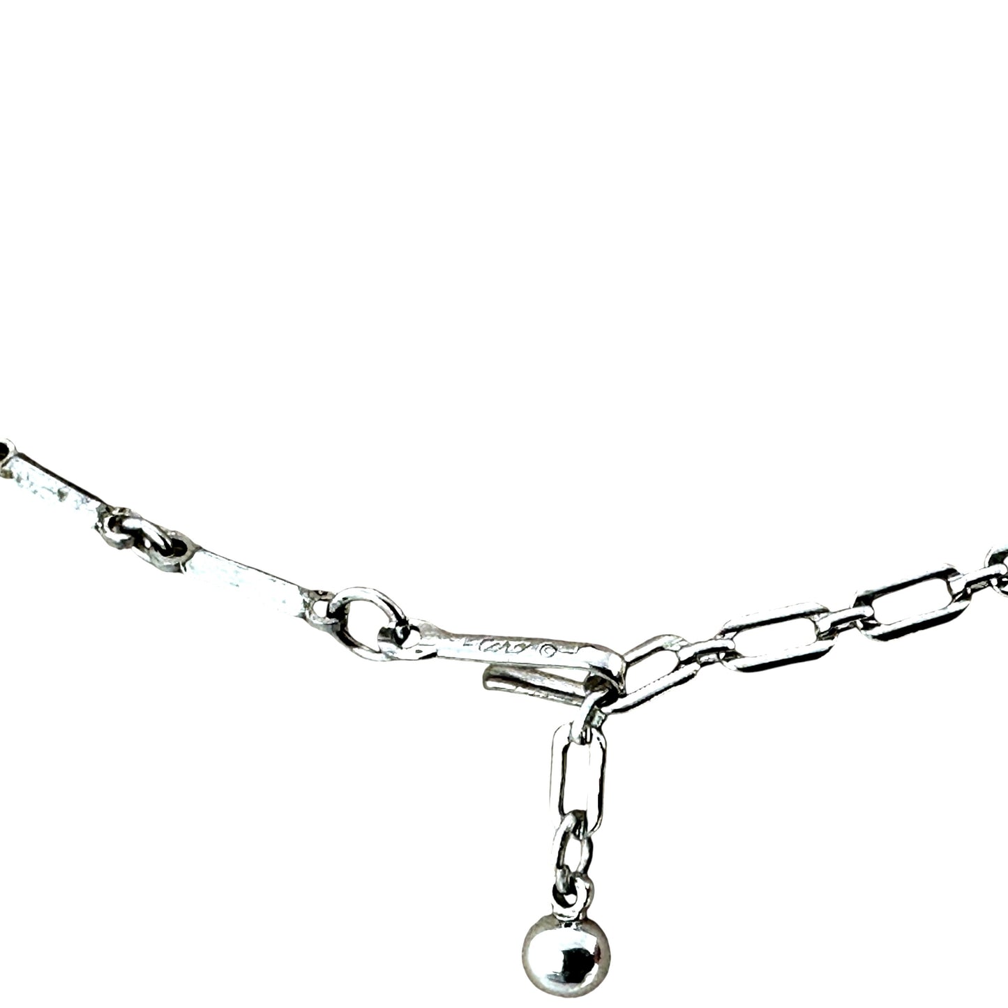 Coro copyright signature stamped on flat bar-link chain of silver-tone rhinestone bib necklace, mid-century construction